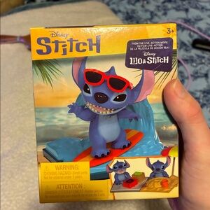 Disney Stitch Surfing Figurine with Red Accents